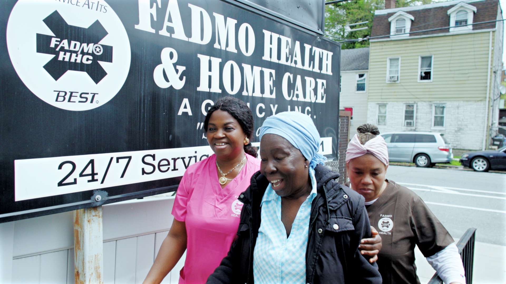 FADMO Health & Home Care Agency caregivers with a client outside the office
